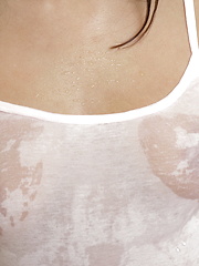 Teasing pleasing Destiny Moody shows her hot tits through a soaking wet tank top