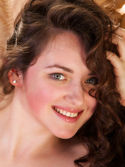 Conchita relaxes on the couch, naked and uninhinbited