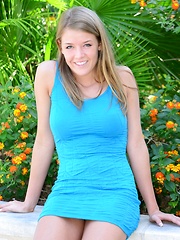 Sophia Winters masturbates with her dildo after removing her tight blue dress